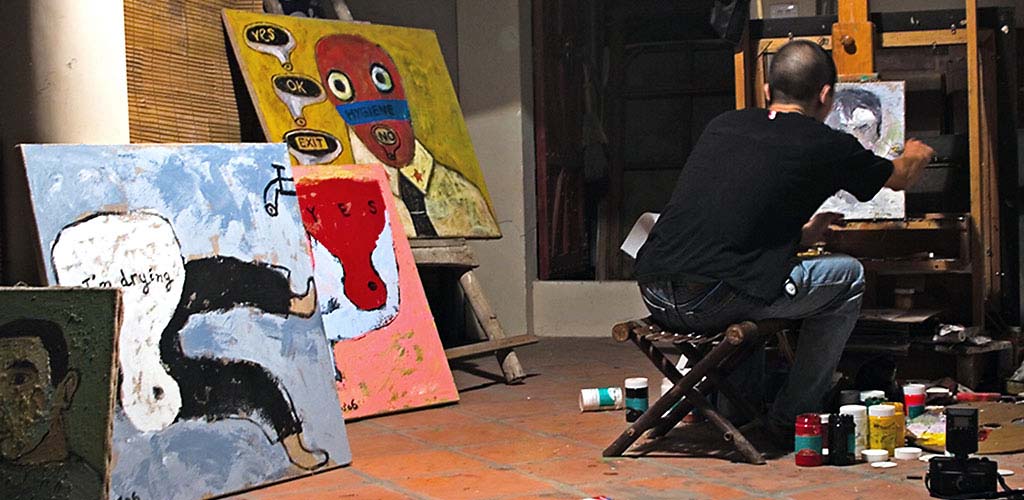 Vietnamese artist in his Hanoi studio