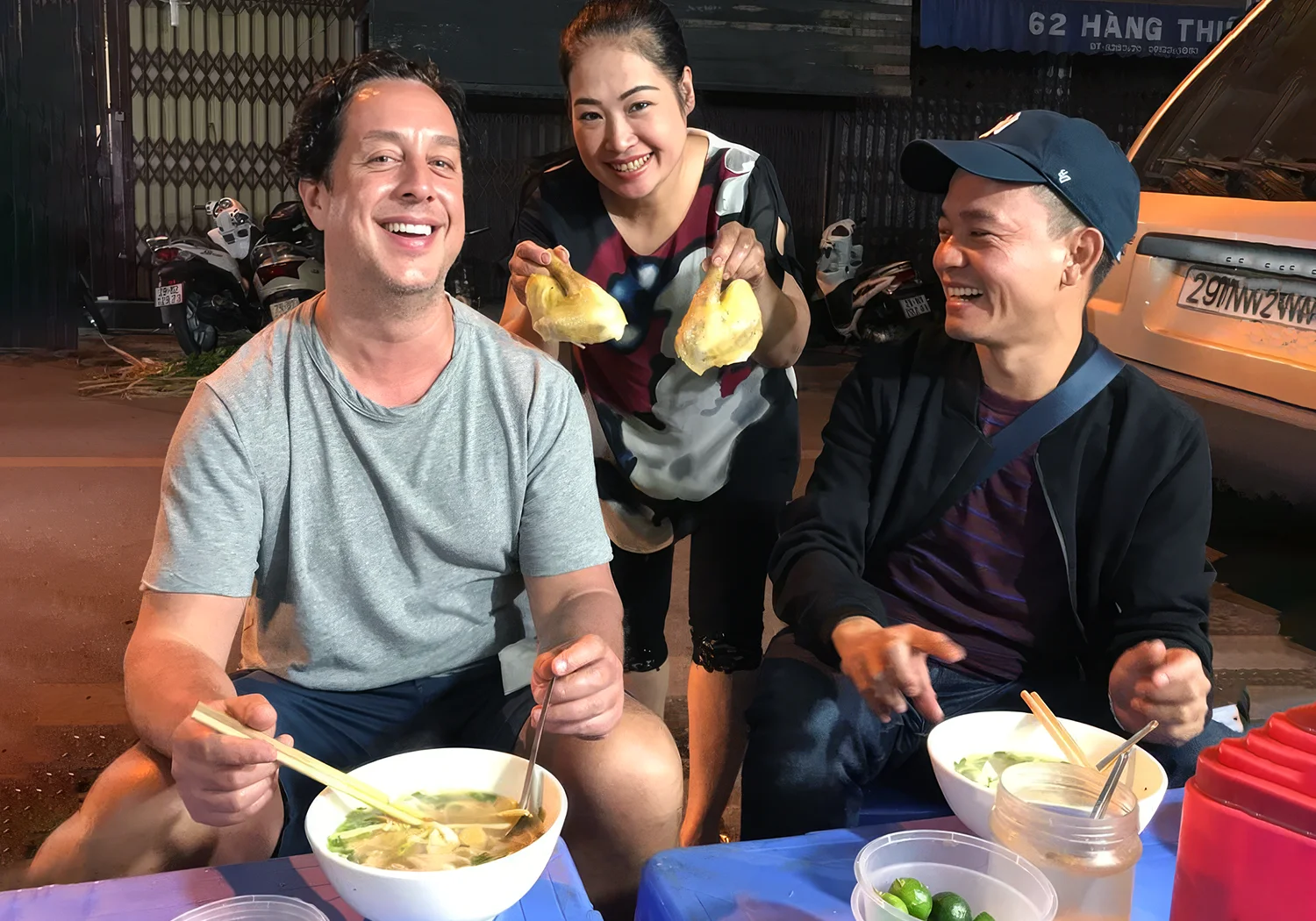 Eating pho on the street in Hanoi