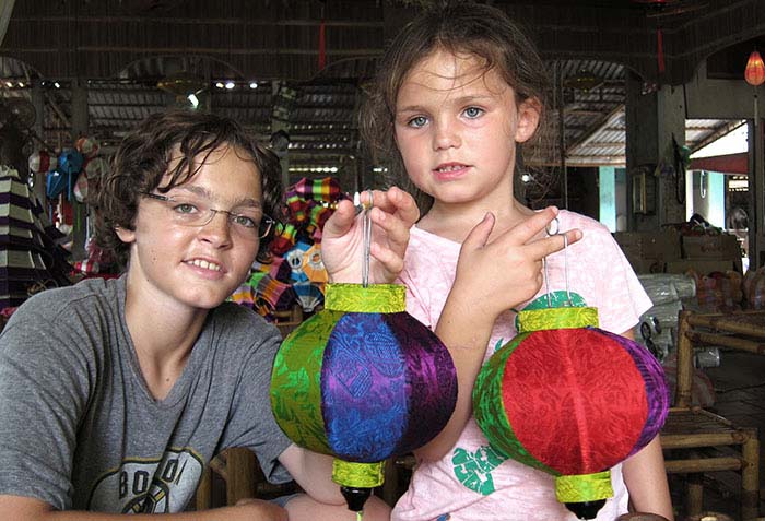 Children making traditional lanterns in Hoi An, Vietnam