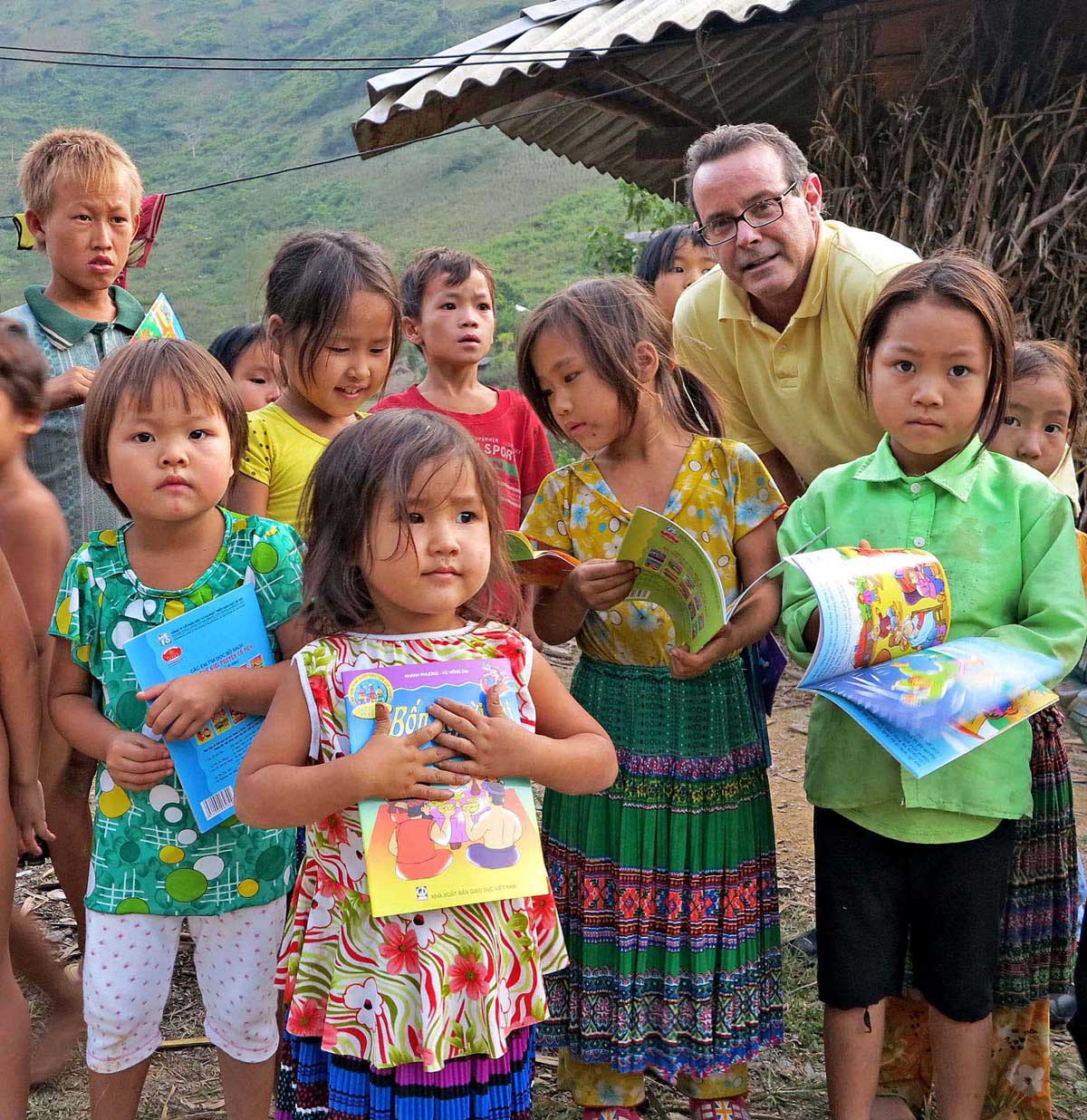Traveler donating books at school in Mai Chau