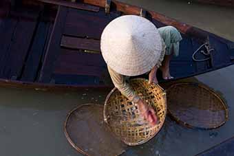 Halong Bay woman fish monger